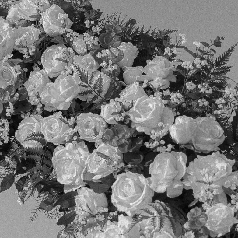 Close-up of high-quality artificial wedding flowers with realistic petals and soft textures.
